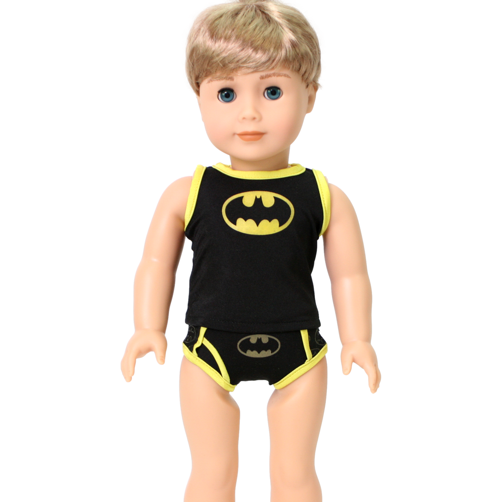 An 18-inch doll wearing a black and yellow two-piece knit underwear set with a Batman-style logo.