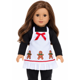 Handcrafted gingerbread Christmas apron for 18" dolls with red bow, gingerbread figures, red trim, and white ruffled hem.