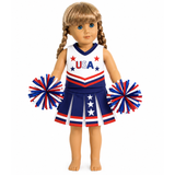 An 18-inch doll with braided blonde hair wearing a patriotic USA cheerleader outfit with a white, red, and blue top and skirt, holding matching red, white, and blue pom-poms.