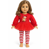 An 18-inch doll with long light brown hair wearing a festive holiday outfit consisting of a bright red long-sleeve top with a reindeer appliqué, a matching red tutu skirt, and red and white striped leggings, shown against a plain white background.