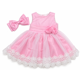 A pink party dress with layered tulle skirt, white lace trim, fabric roses, and matching pink hair bow for an 18-inch doll.