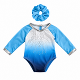  Blue ombre gymnastics leotard with sparkling rhinestones, silver trim, and matching blue scrunchie that fits an 18=inch doll