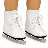 A pair of white faux-leather ice skates with white laces and silver blades, shown on an 18-inch doll's feet.