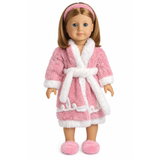 An 18" doll wearing a pink chenille bathrobe with white trim, waist tie, and matching pink slippers.