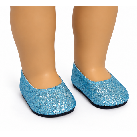 Baby blue glitter ballet flats displayed on the feet of an 18-inch doll.