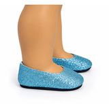 Baby blue glitter ballet flats displayed on the feet of an 18-inch doll.