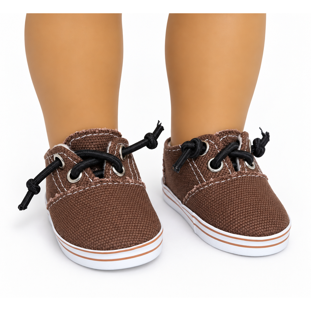 Brown canvas no-tie shoes for 18-inch dolls with black laces, silver-tone eyelets, white stitching, and white striped soles.