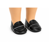 A pair of black slip-on loafers shoes designed for 18-inch dolls, displayed against a white background.