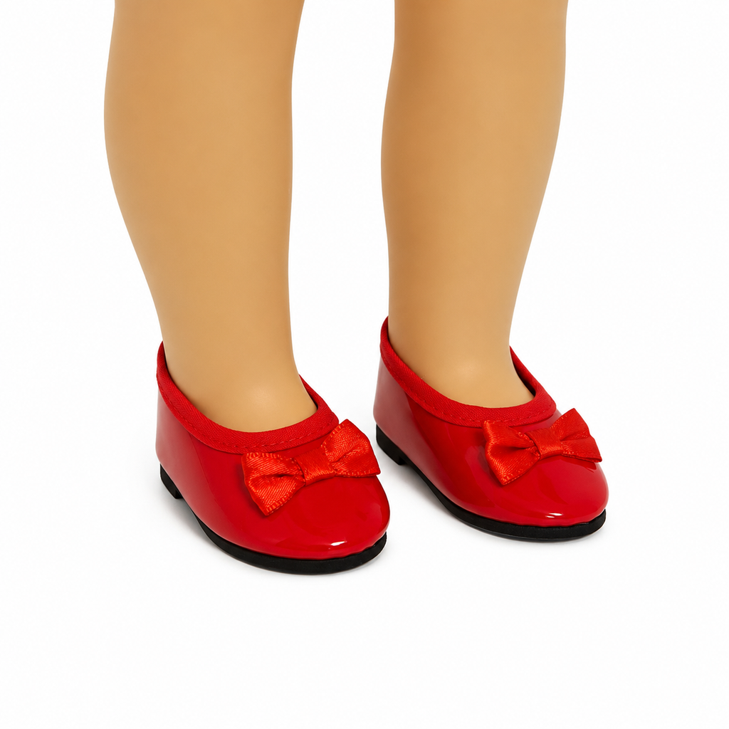Red patent leather-style bow flats with satin bows and black soles, shown on an 18-inch doll against a clean white background.