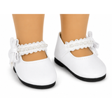 White dress shoes with pearl trim designed to fit 18-inch dolls.