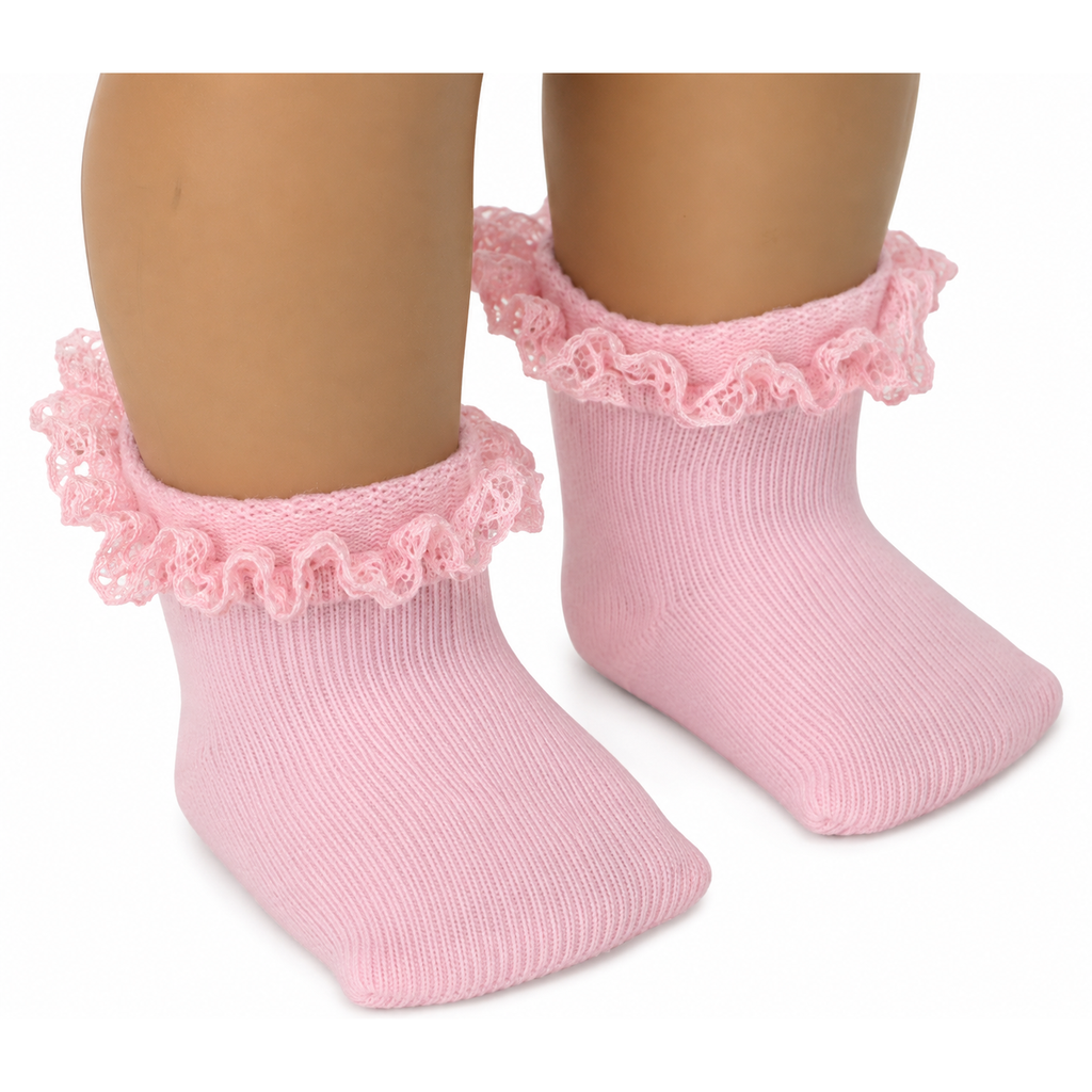 Pink ribbed ankle socks with a ruffled lace cuff, shown on an 18-inch doll's legs against a white background.