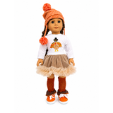 An 18-inch doll wearing a fall-themed outfit, including an orange knit beanie with a turkey graphic on the shirt, a brown velvet skirt with a beige tulle ruffle, and orange and black striped leggings.